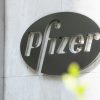 NEW YORK, NY - JULY 22: Pfizer Inc. signage is seen on July 22, 2020 in New York City. Pfizer and German biotechnology firm BioNTech have agreed to supply the U.S. government with 100 million doses of coronavirus vaccine under a $1.95 billion deal.   Jeenah Moon/Getty Images/AFP
