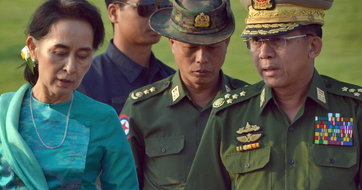 FILE - In this May 6, 2016, file photo, Aung San Suu Kyi, left, Myanmar's foreign minister, walks with senior General Min Aung Hlaing, right, Myanmar military's commander-in-chief, in Naypyitaw, Myanmar. Myanmar military television said Monday, Feb. 1, 2021 that the military was taking control of the country for one year, while reports said many of the country’s senior politicians including Suu Kyi had been detained. (AP Photo/Aung Shine Oo, File)