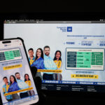 Celular y pantalla de computador con imágenes de la Operación Renta.